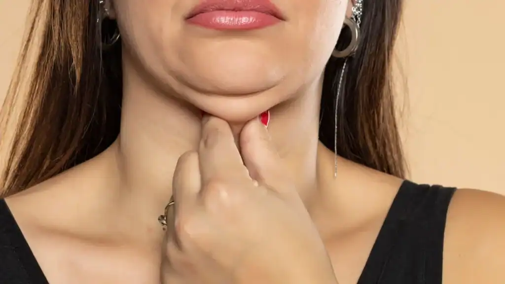 An image of a woman with double chin, sad, worried : Non Surgical Double Chin Removal Treatment in Brockenhurst, UK